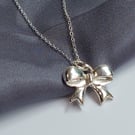 Silver Bow Style Necklace