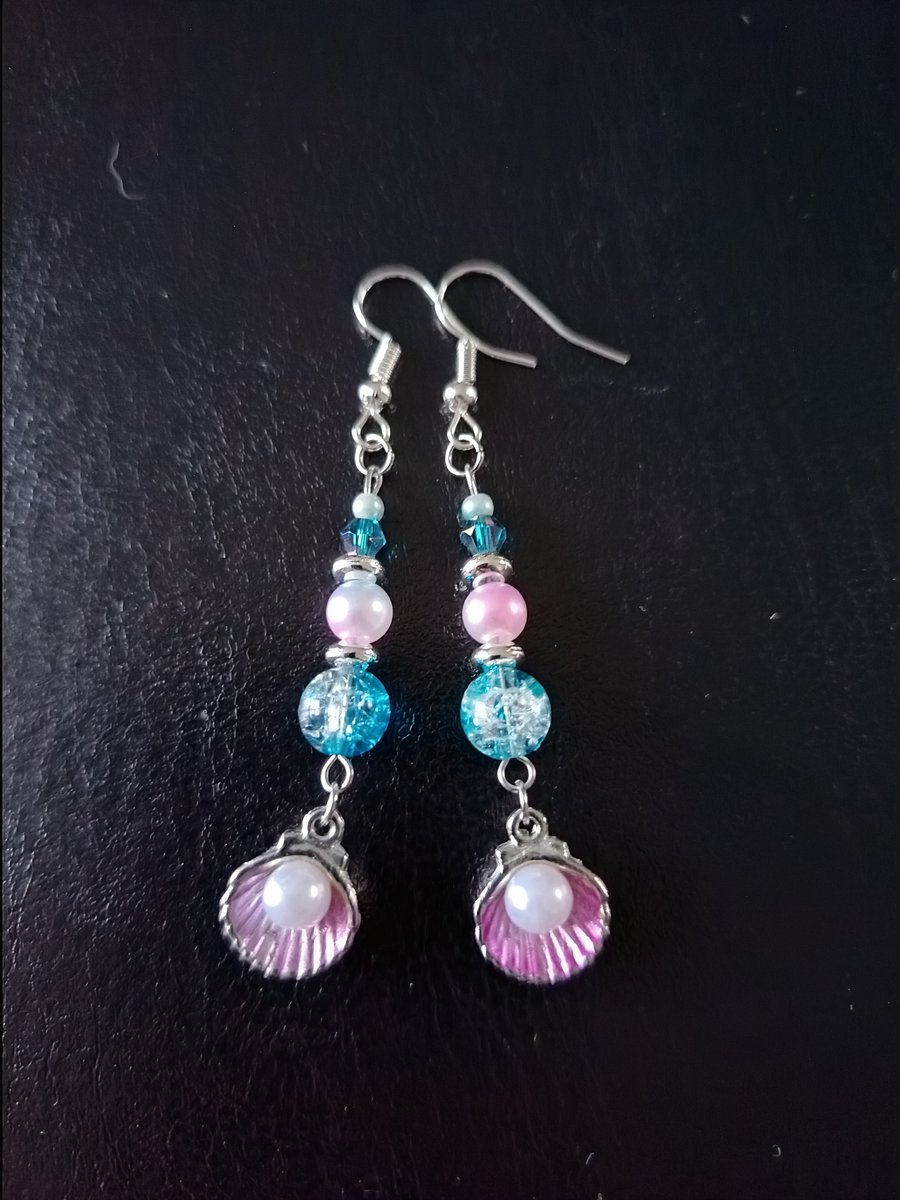 Silver and pink scallop shell dangle earrings with blue and pastel beads