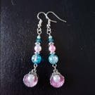 Silver and pink scallop shell dangle earrings with blue and pastel beads