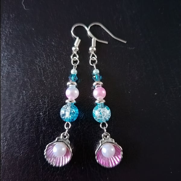 Silver and pink scallop shell dangle earrings with blue and pastel beads