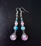 Silver and pink scallop shell dangle earrings with blue and pastel beads