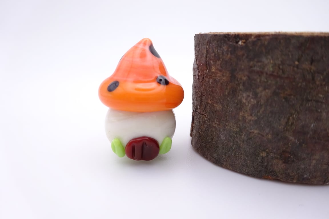 small glass toadstool house