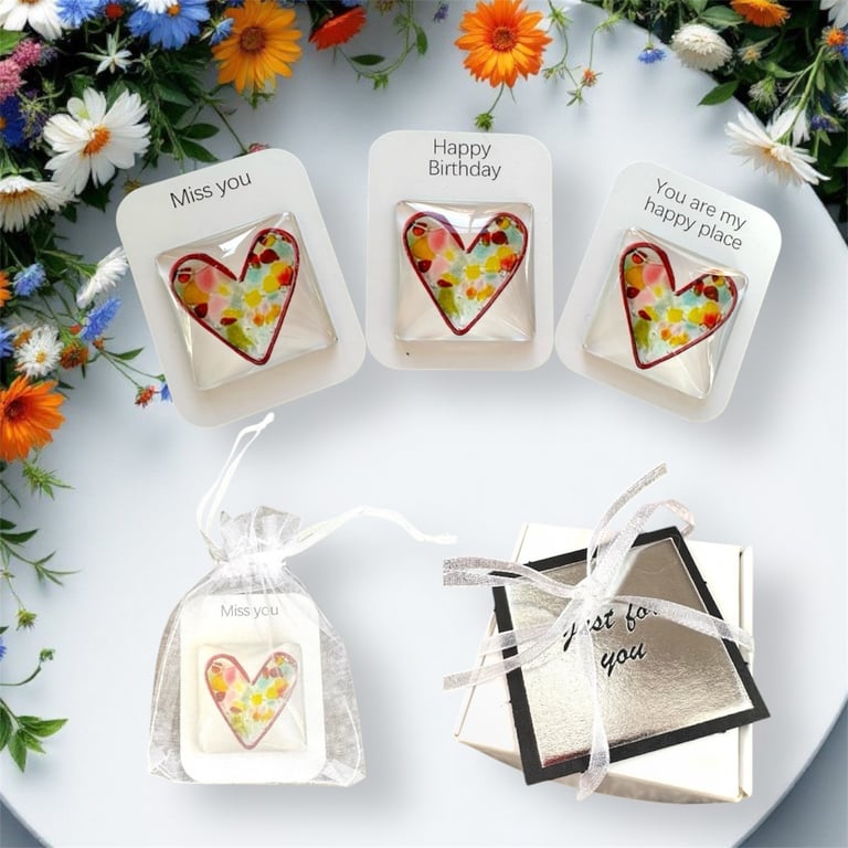 Colourful glass heart on a message card, gift box, small gift, love token 