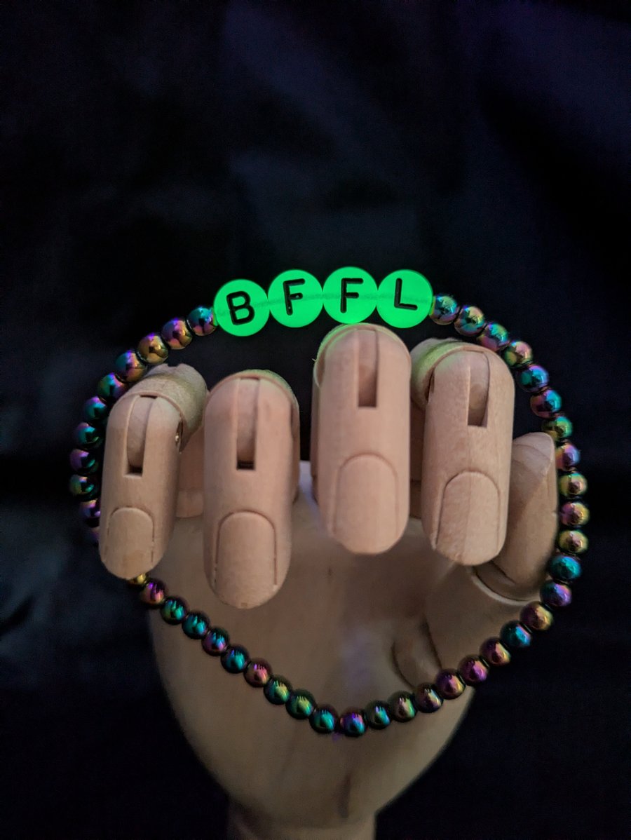 Glow in the dark letter bead bracelet 'BFFL' with Hamatite crystal beads.