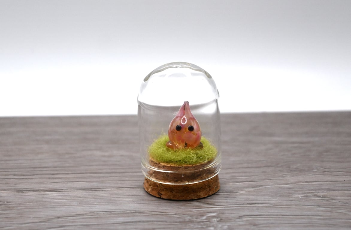 small glass wisp keepsake figure