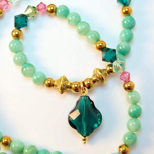 Swarovski Crystal, Shell & Gold Hematite Necklace With Swarovski Emerald Pendant