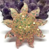 Pastel glitter sun large statement brooch with a roll over clasp.