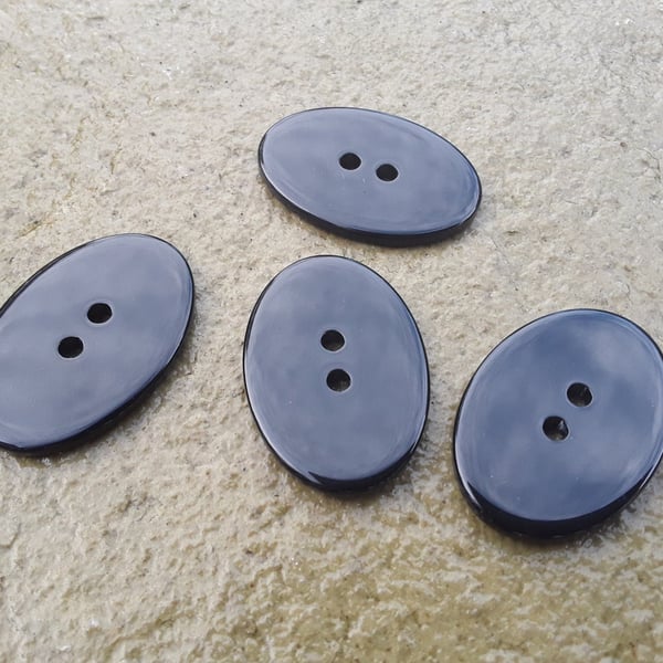 2 x 1 & 1 4" 48mm by 33mm Black Oval 2 hole button
