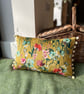 Yellow floral velvet cushion cover with blush pink cotton back and pompoms - Image 1