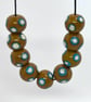 Handmade brown and turquoise lamp work glass beads - Image 5