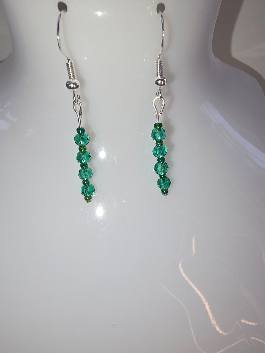 Green faceted rondelle earrings