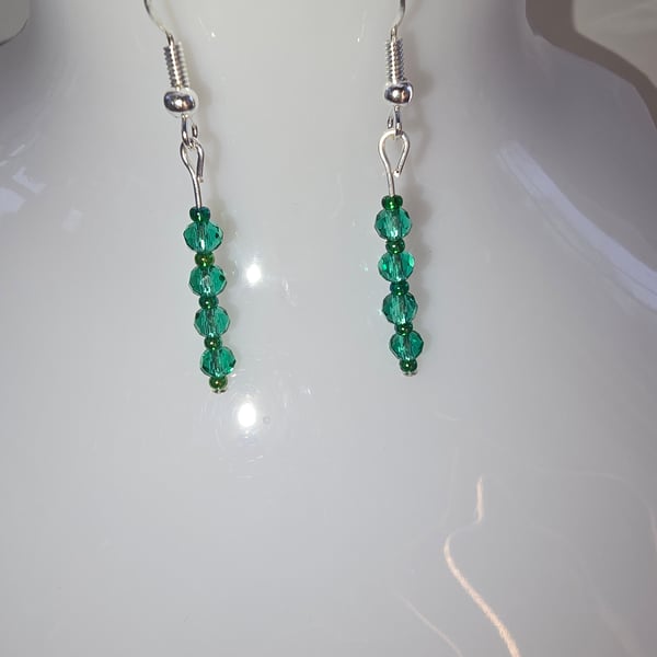 Green faceted rondelle earrings