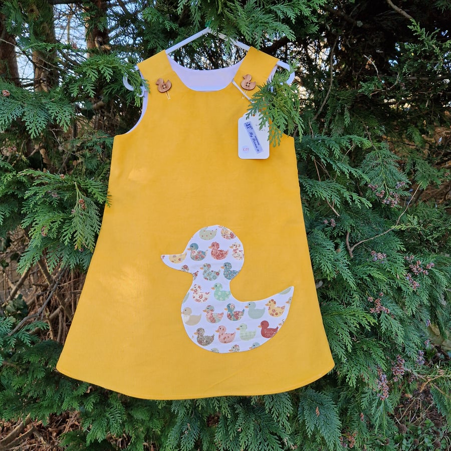 Age: 4-5yr Yellow Duck Applique Needlecord dress. 