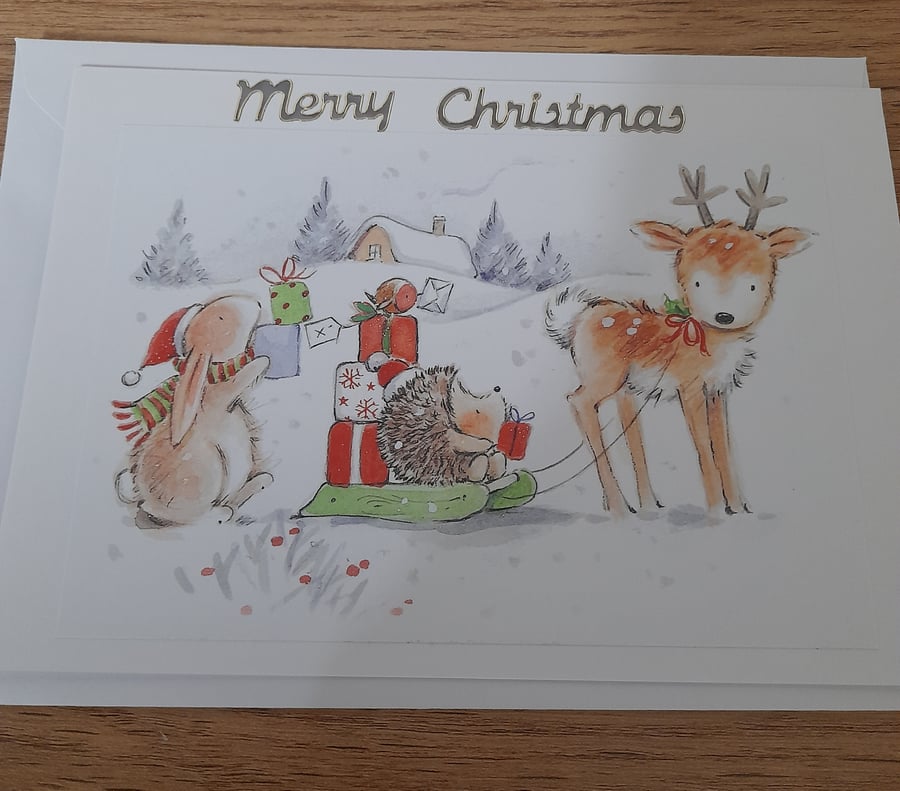CUTE CHRISTMAS CARD WITH REINDEER PULLING A SLEIGH 