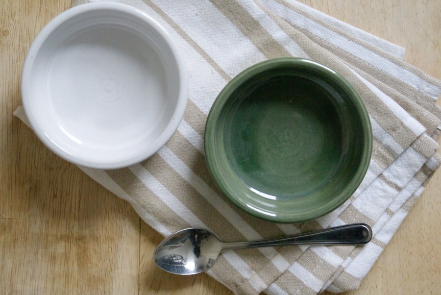 Set of two snack bowls in brilliant white and forest green - hand thrown pottery
