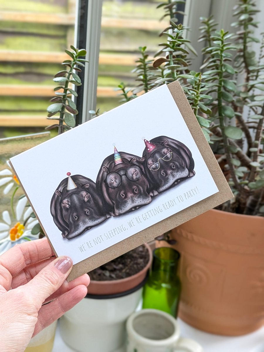 Sleepy Hippos Birthday Card, 'We're Not Sleeping, We're Getting Ready to Party'.