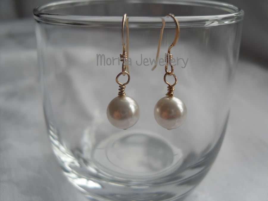 White pearl earrings