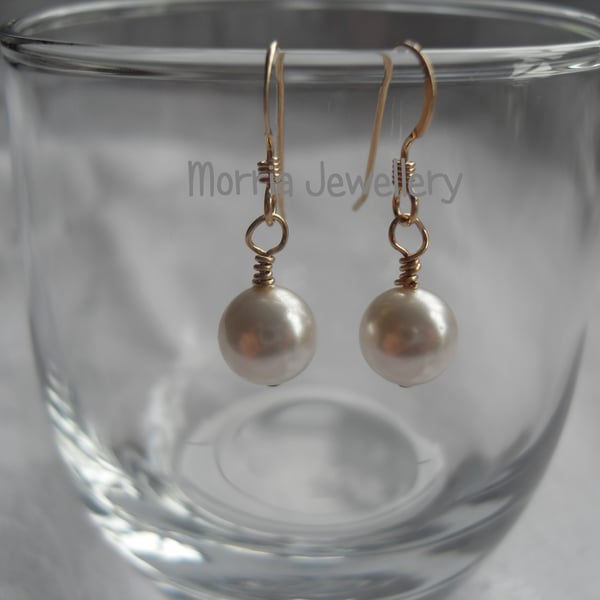 White pearl earrings