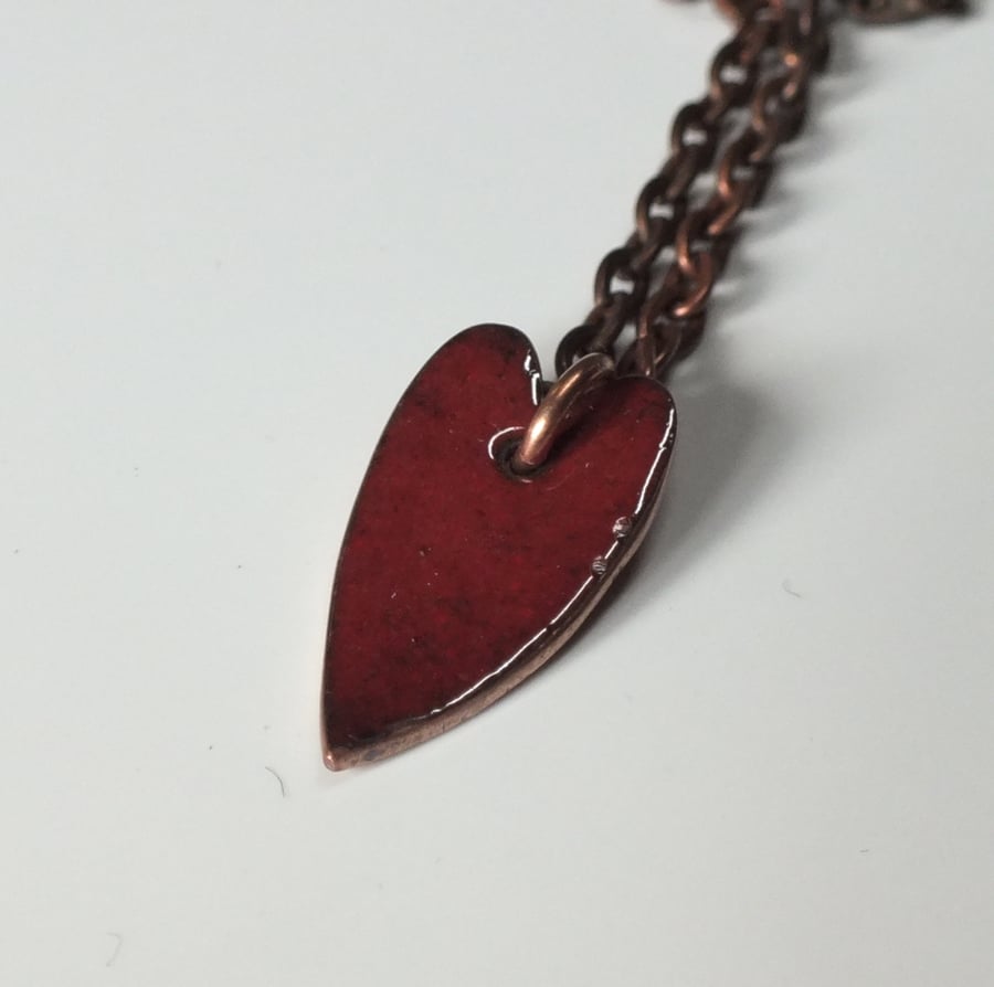 Red elongated heart enamel pendant