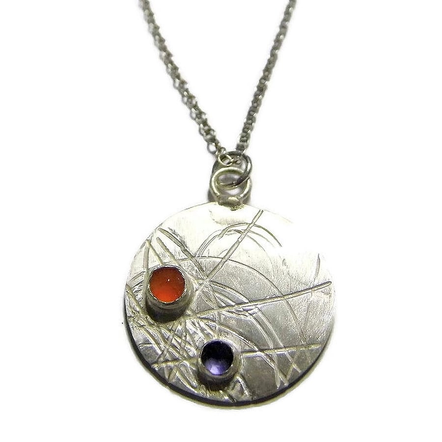 rose cut carnelian and iolite on roller printed sterling silver disc pendant