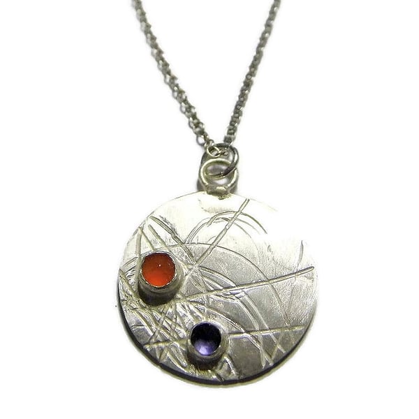 rose cut carnelian and iolite on roller printed sterling silver disc pendant