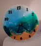 Handmade 'beach scene' epoxy resin clock with hanger. Battery operated.