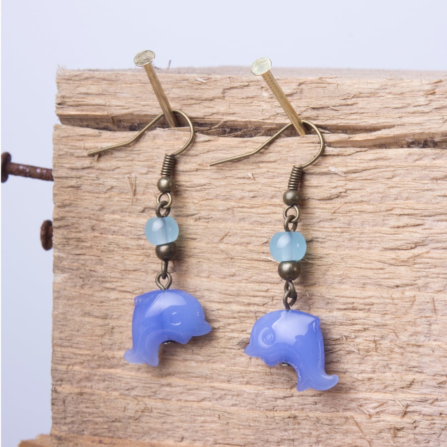 Dolphin Earrings - Blue dolphin dangle earrings with blue and bronze beads.
