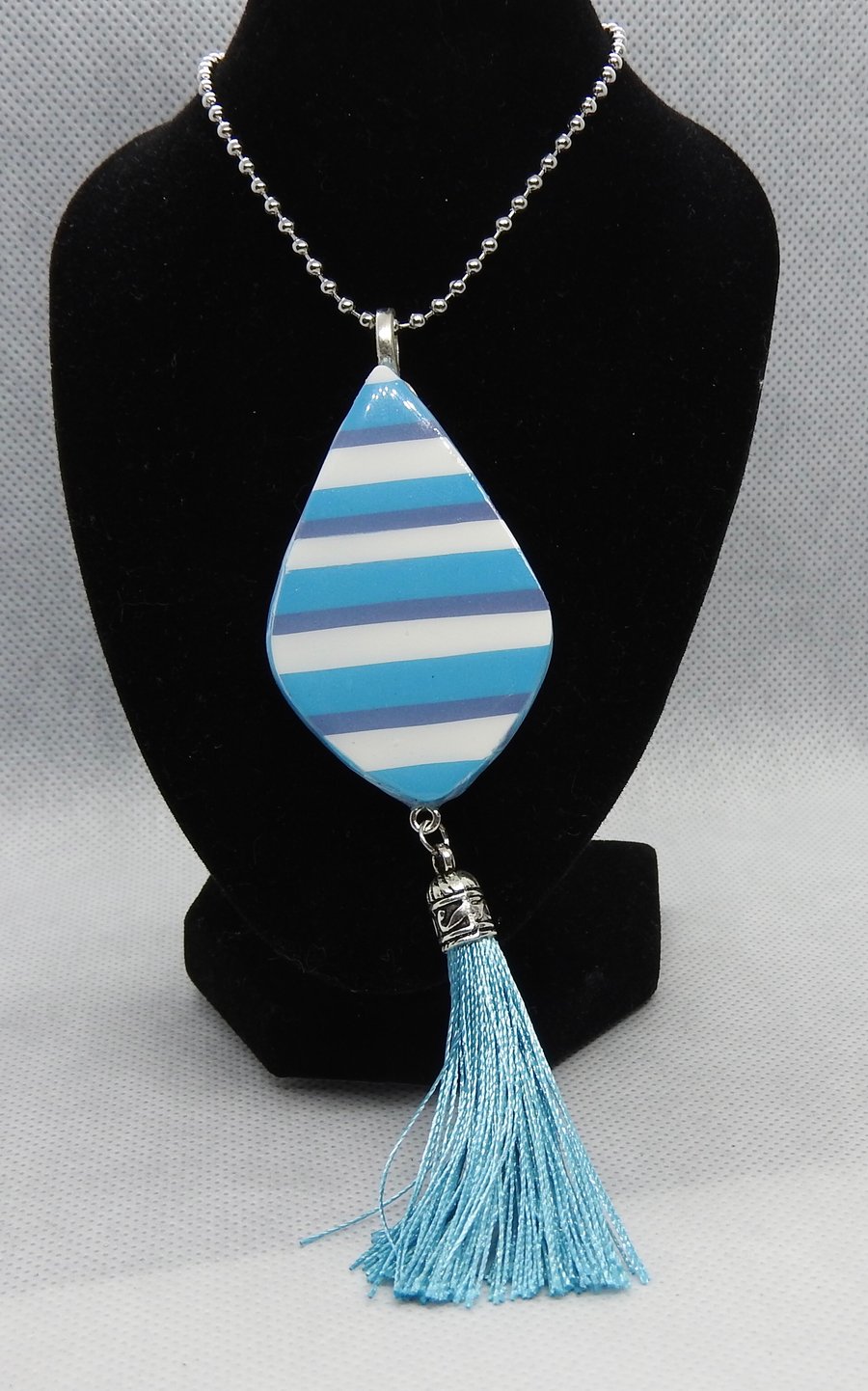 Light blue striped tassel pendant 