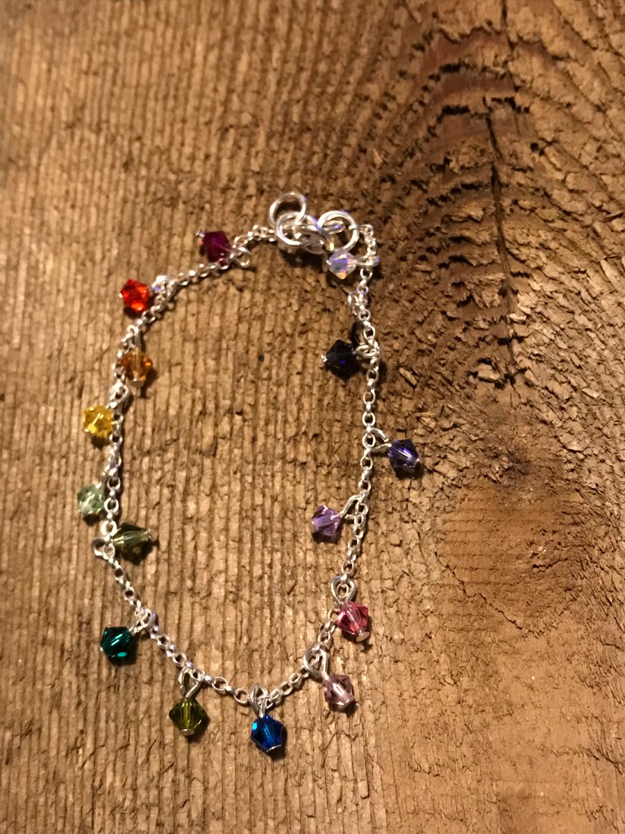 Sterling silver bracelet with rainbow coloured Swarovski crystal beads
