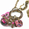 Sale more than Half price. Love necklace with butterfly and flower charms.
