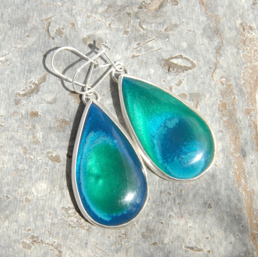 Large 'wave' bowlerite and sterling silver drop earrings