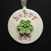 Ceramic decoration Happy Day with flower button