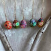 5 pretty, hanging decorated wooden eggs