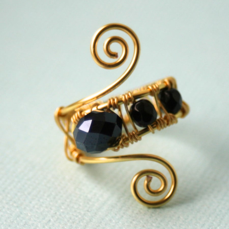 Wire wrapped black and gold cocktail ring