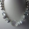 SILVER, GREY AND CRYSTAL CHUNKY NECKLACE.  725
