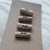 Four driftwood toggle buttons