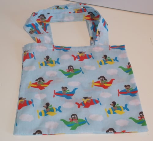 Mini tote bag for with a print dogs in planes