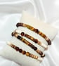 Coconut Shell Bead & Tigers Eye Bracelets - Image 1