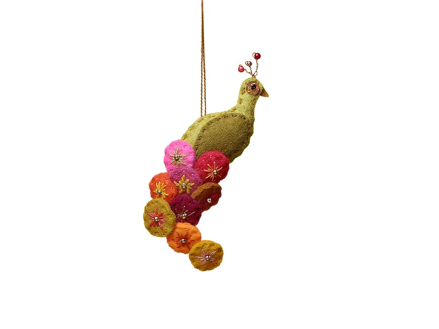 Mustard felt peacock hanging ornament with bright coloured tail