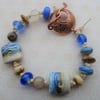handmade lampwork blue beach bracelet