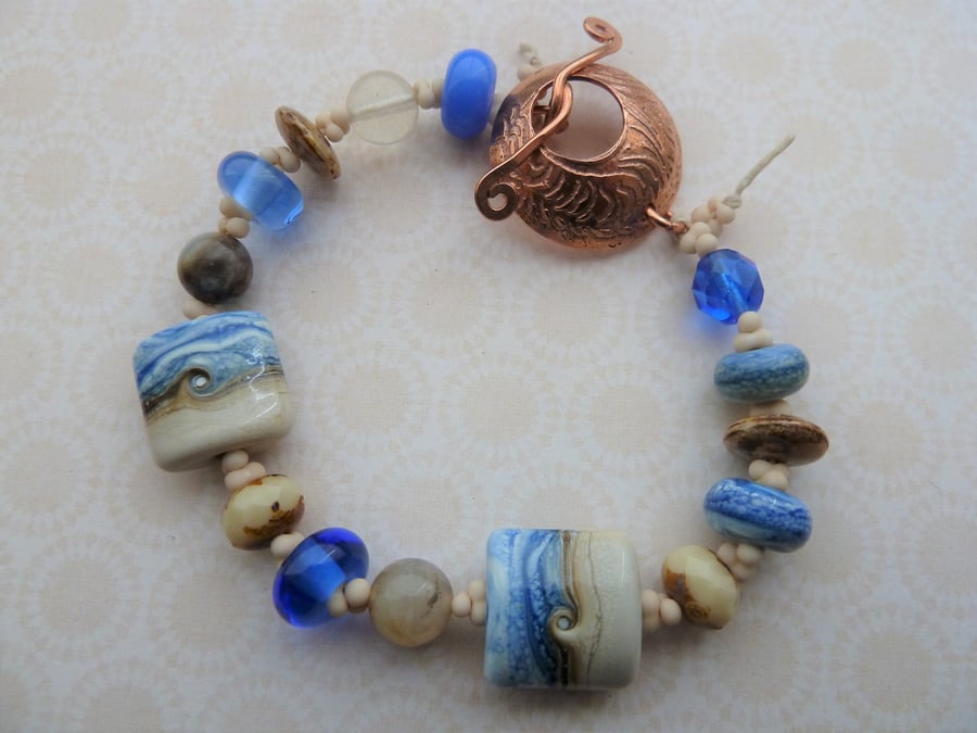 handmade lampwork blue beach bracelet