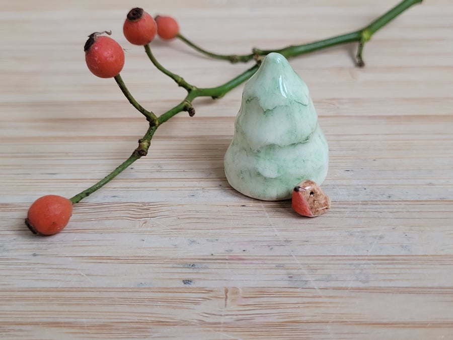 Miniature ceramic robin sculpture with Christmas tree, cake toppers or ornament 
