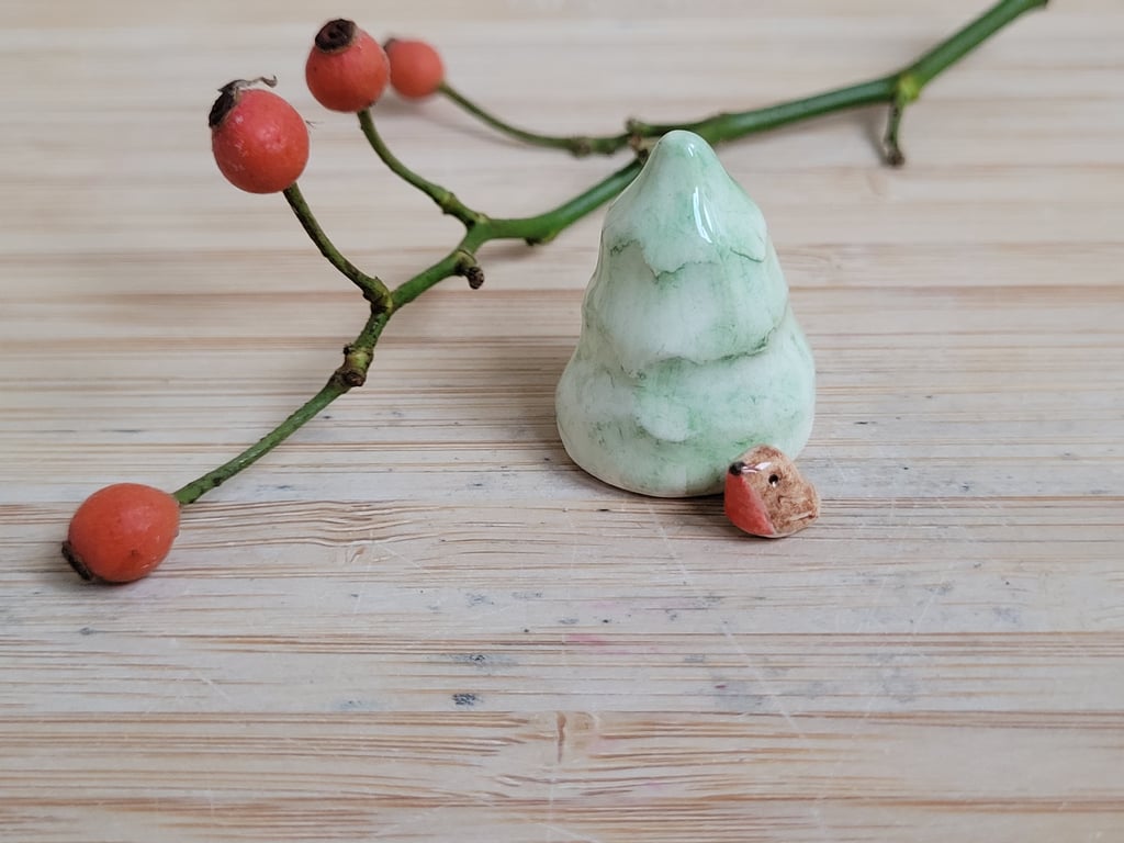 Miniature ceramic robin sculpture with Christmas tree, cake toppers or ornament 