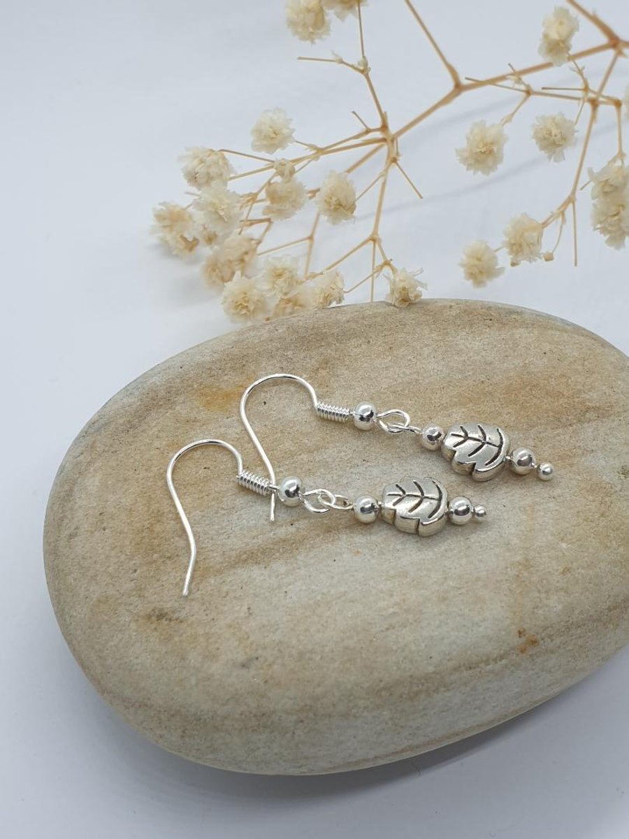 silver plated earrings with tiny cast silver leaf charms boho style 