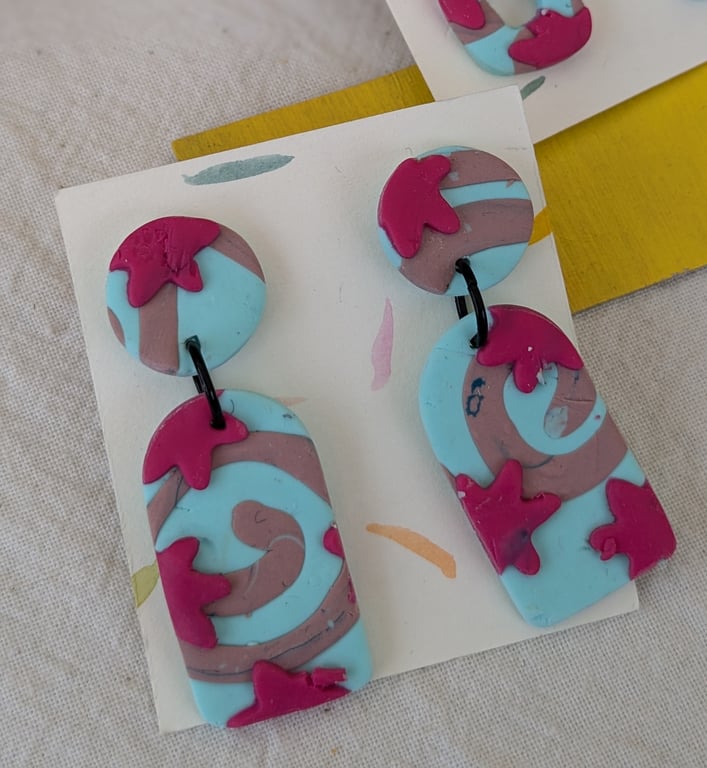 Statement earrings,  pale blue and pink dangly fimo earrings. 