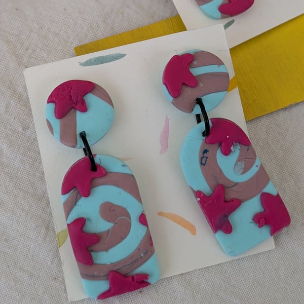 Statement earrings,  pale blue and pink dangly fimo earrings. 