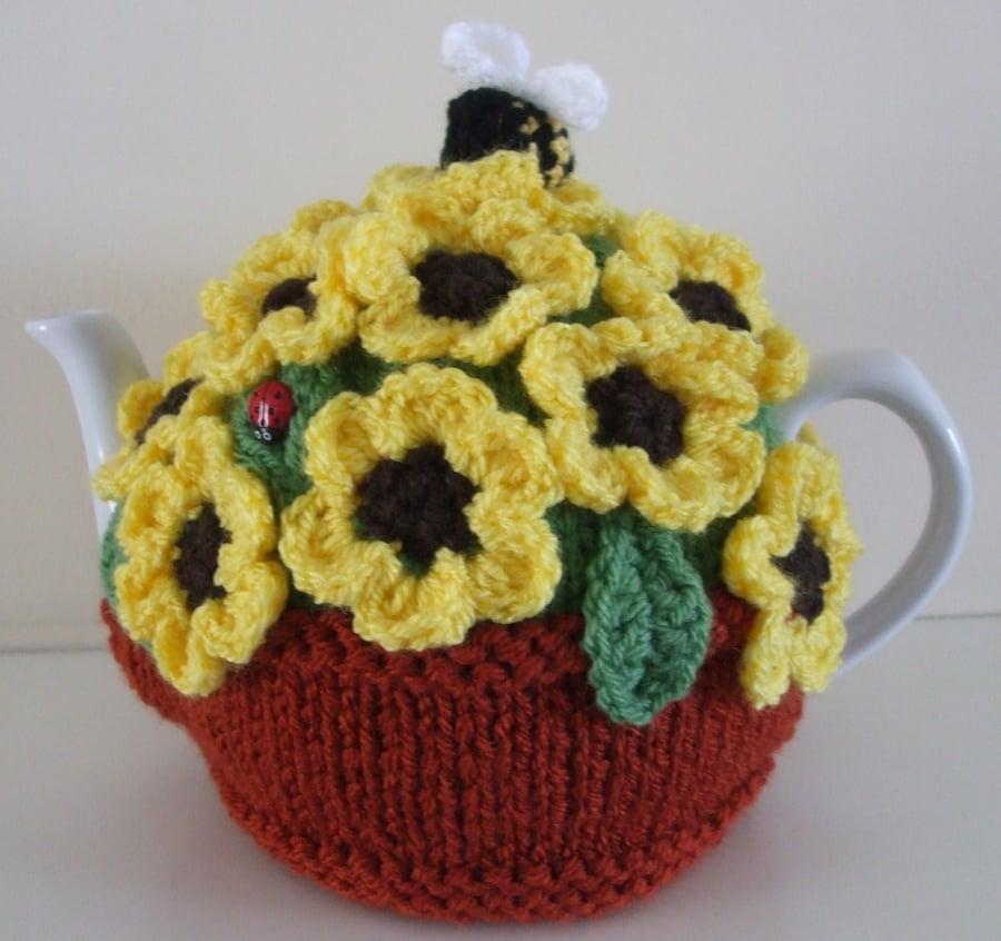 Hand Knitted Tea Cosy with Crocheted Yellow Flowers