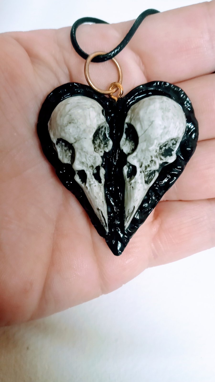 Raven Twin skull heart pendant on 16inch wax cord 