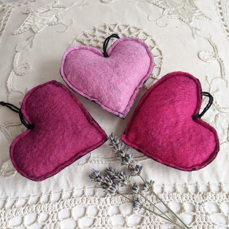 Three lavender hearts in shades of pink