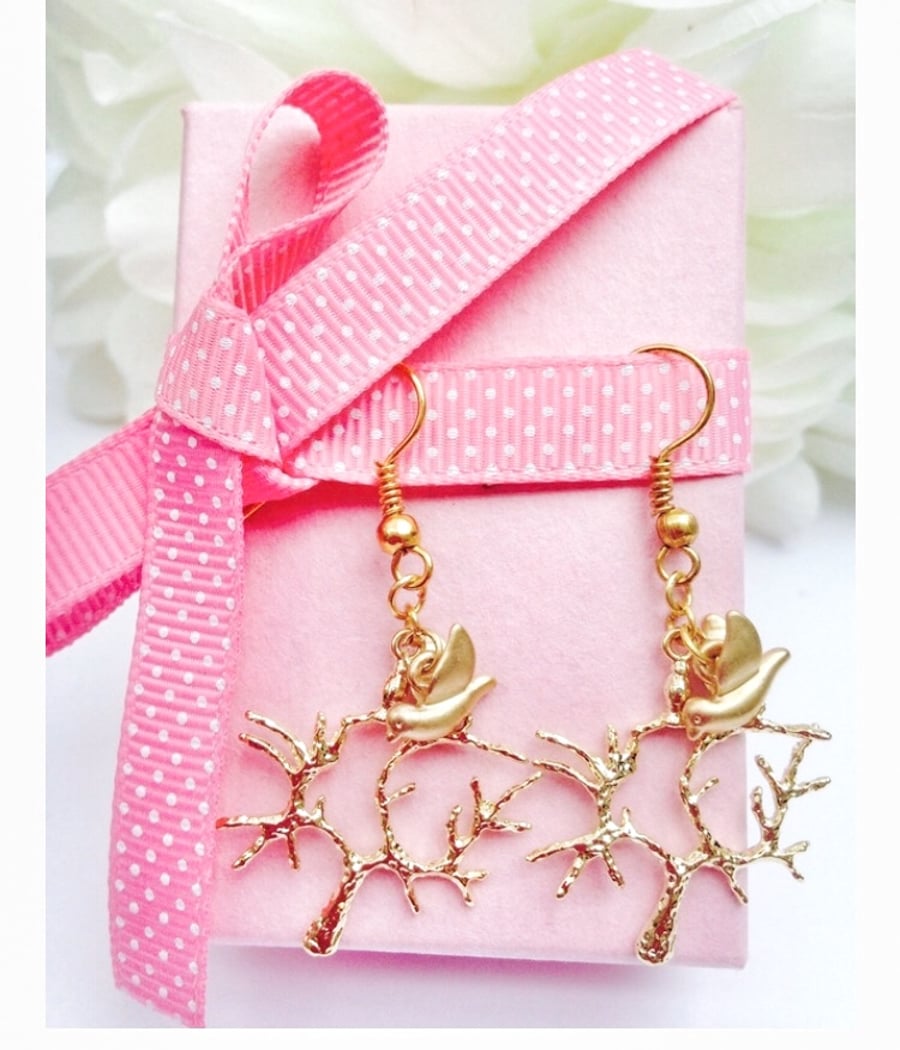  golden tree earrings with gold plated dove charm. 